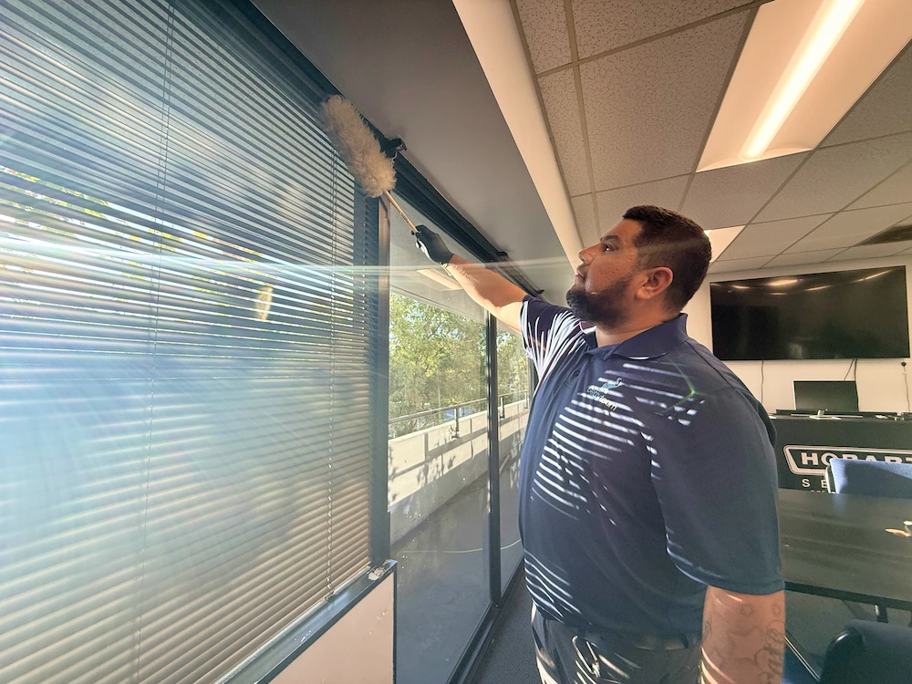Getty Team employee performing detail cleaning in a commercial office