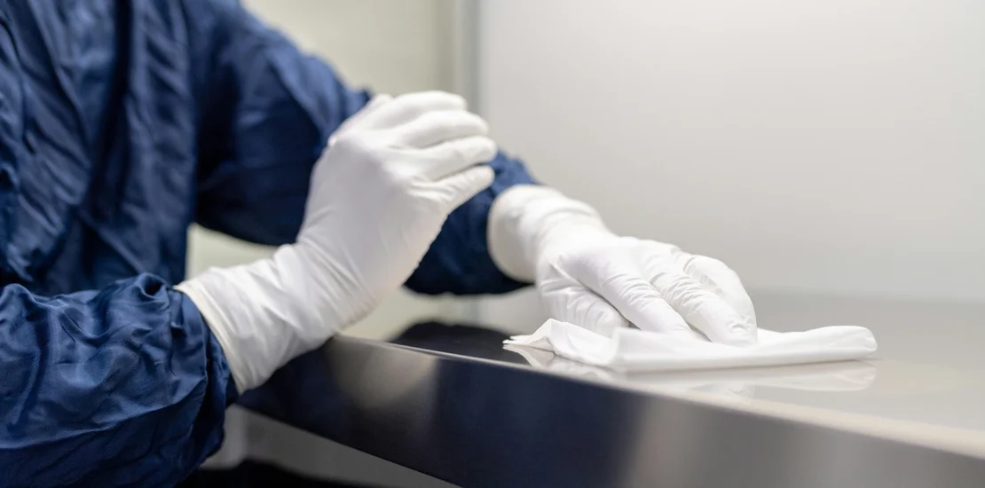 Environmental services professional cleaning an outpatient healthcare facility